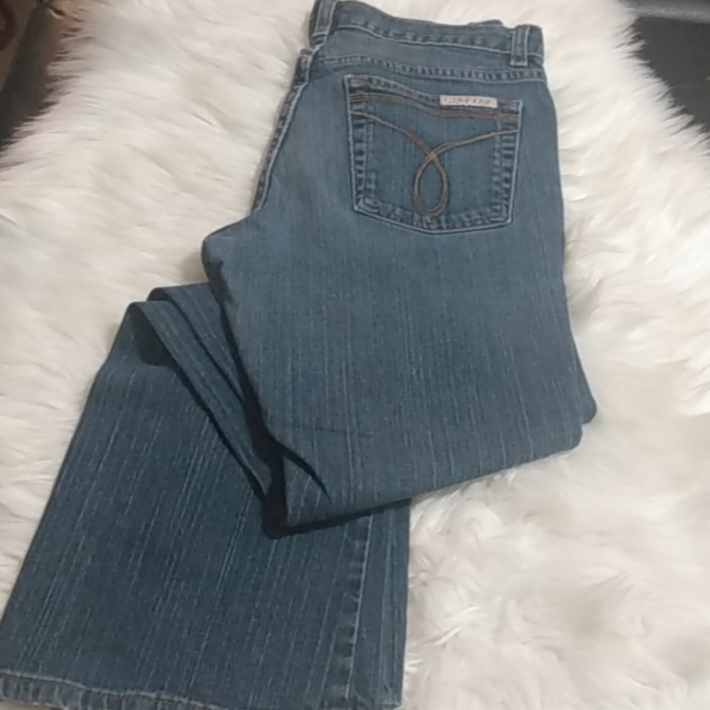 Calvin Klein medium wash flare jeans